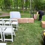 arranging boxes for ceremony set up